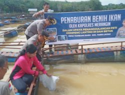 Kapolres Merangin Bersama Kadis Perikanan Merangin Laksanakan Tabur Benih Ikan diDam Betuk