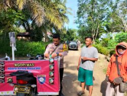 ” NGOPI GRATIS ” Polsek Tabir Mengajak Warga Berperan dalam Menjaga Kamtibmas.