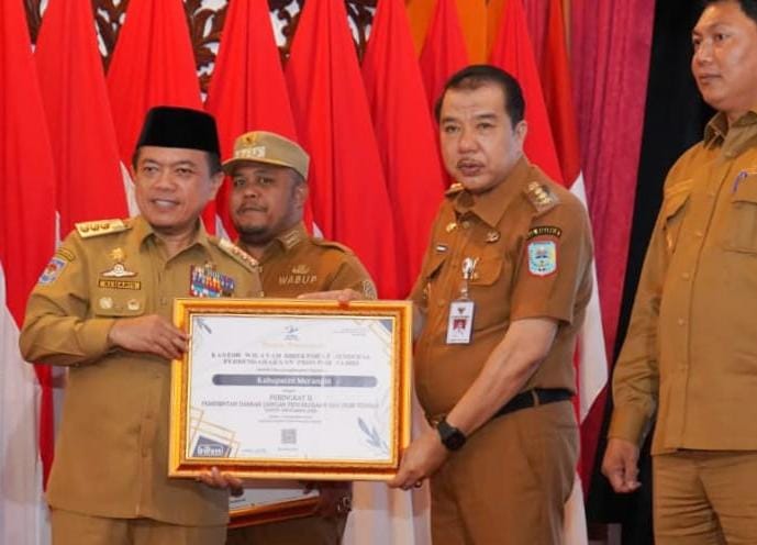 Merangin Terbaik Kedua Pengelolaan DAK Fisik 2023 diterima Pj Bupati H Mukti, pada Acara Penyerahan DIPA Secara Digital