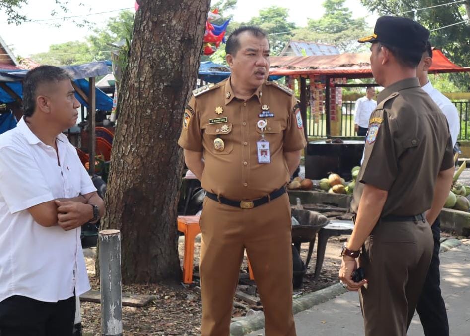 Mari Bersama Tertibkan Kota Bangko Pj Bupati Merangin Pantau Penertiban RTH dan Trotoar