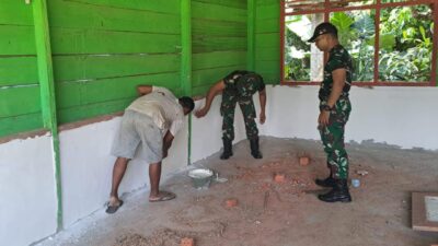 Dinding Madrasah Darul Ulum Desa Bedeng Rejo Mulai Diperhalus oleh satgas TMMD ke 122 Kodim 0420 Sarko