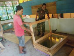 Satgas TMMD ke-122 Kodim 0420/Sarko Pasang Pintu dan Jendela Madrasah 