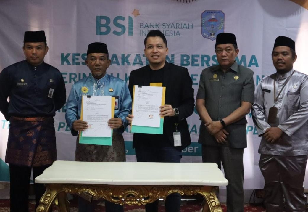 Pj Bupati Teken MoU dengan PT BSI dan PT DSM Tentang Layanan Jasa Perbankan dan Pemanfaatan Jasa Alih Daya