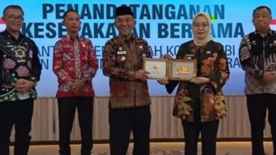 Pj Bupati Merangin Teken MoU dengan Pemkot Jambi tentang Pengembangan Pembangunan Potensi Daerah