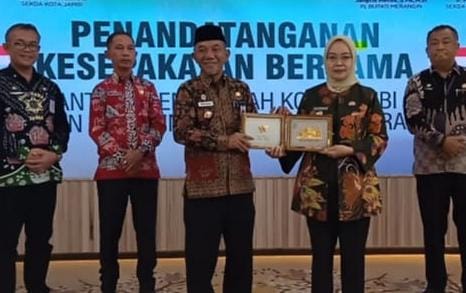 Pj Bupati Merangin Teken MoU dengan Pemkot Jambi tentang Pengembangan Pembangunan Potensi Daerah