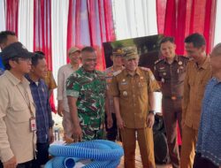 Kasdim 0420/Sarko Mewakili Dandim Bersama Pemkab Merangin Hadir Dalam Zoom Meeting dan Tanam Padi Serentak di Desa Tambang Emas