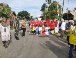 Babinsa Koramil 420-07/Sei Manau Serka Suwarno Meriahkan Gerak Jalan Indah di Pangkalan Jambu