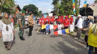 Babinsa Koramil 420-07/Sei Manau Serka Suwarno Meriahkan Gerak Jalan Indah di Pangkalan Jambu
