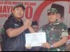 Serma Sumarlis Hadiri dan Amankan Karnaval HUT RI Ke-80 di Desa Muara Delang