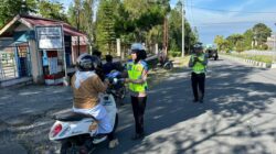 Pelayanan Pagi untuk Masyarakat, Polres Aceh Tengah Bantu Seberangkan Warga dan Anak Sekolah di Titik Padat Aktivitas